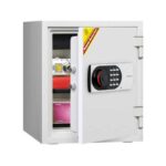 Ivory Diplomat 125 safe shown open with a combination dial, key lock and items arranged inside.